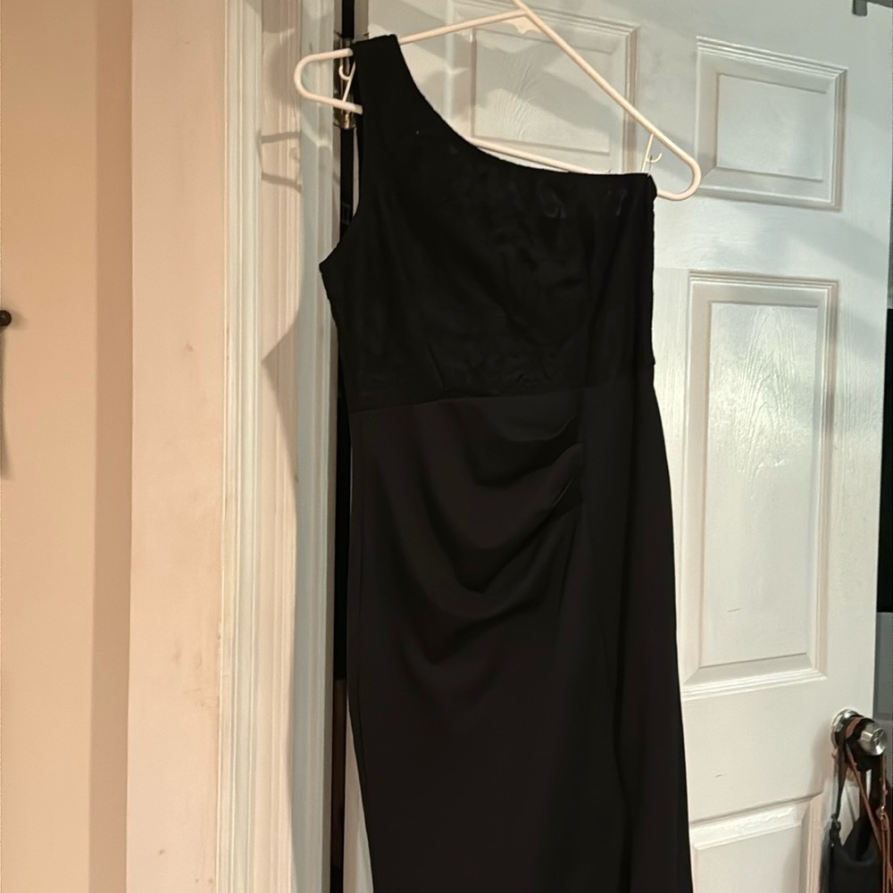 Black evening gown size SM. Lace top, leg slit on left side. Worn once.